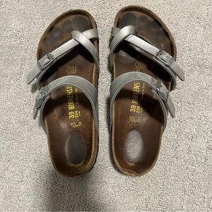 Birkenstock Silver Sandals with Adjustable Straps and Contoured Footbed